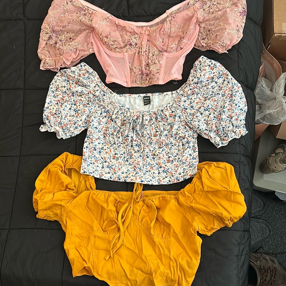 Corset style crop tops. Never worn. Selling all 3 together.